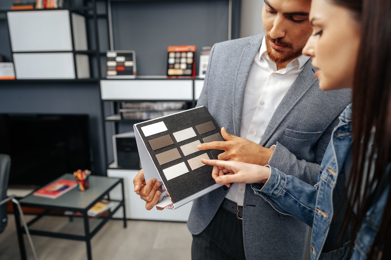 two people chosing perfect colour for painting kitchen cieling