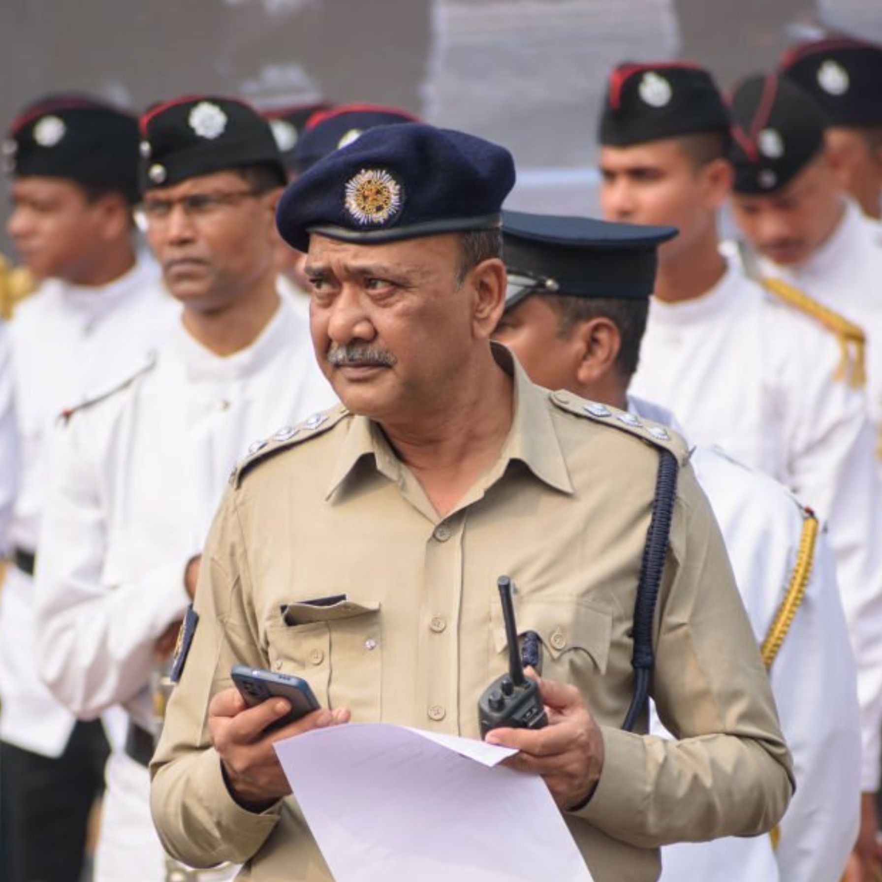 Police officer representing the tenant verification process in Rural Thane for landlords and tenants.